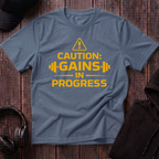 Caution Gains In Progress Tee